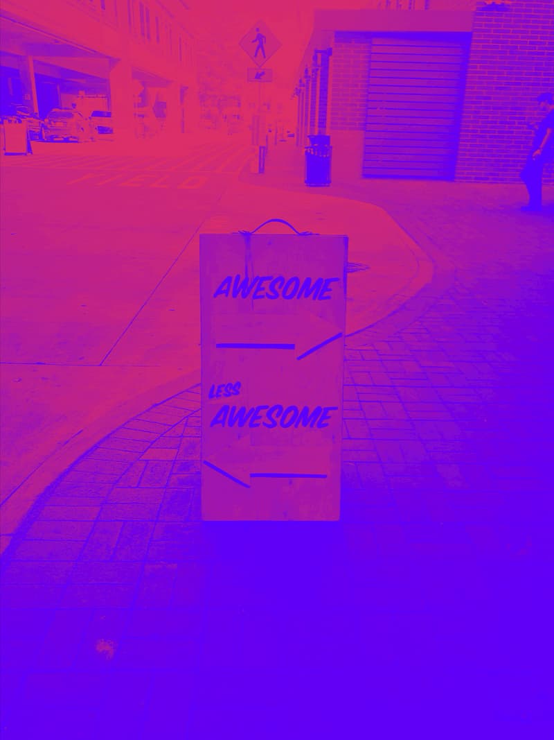 make-the-most-of-customer-reviews-from-scratch-communications sign with 2 arrow pointing in opposite directions — awesome and less awesome