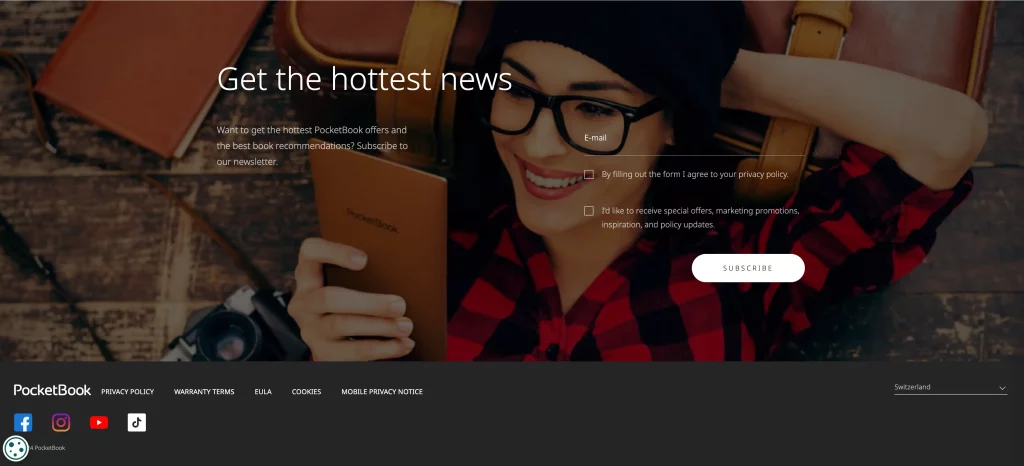 Final section and footer on the PocketBook homepage. H2: Get the hottest news. Body text: Want to get the hottest PocketBook offers and the best book recommendations? Subscribe to our newsletter. Email signup form. Footer includes links to the privacy policy, warranty terms, EULA, Cookies, mobile privacy notice, country selector, Facebook, Instagram, YouTube and TikTok.