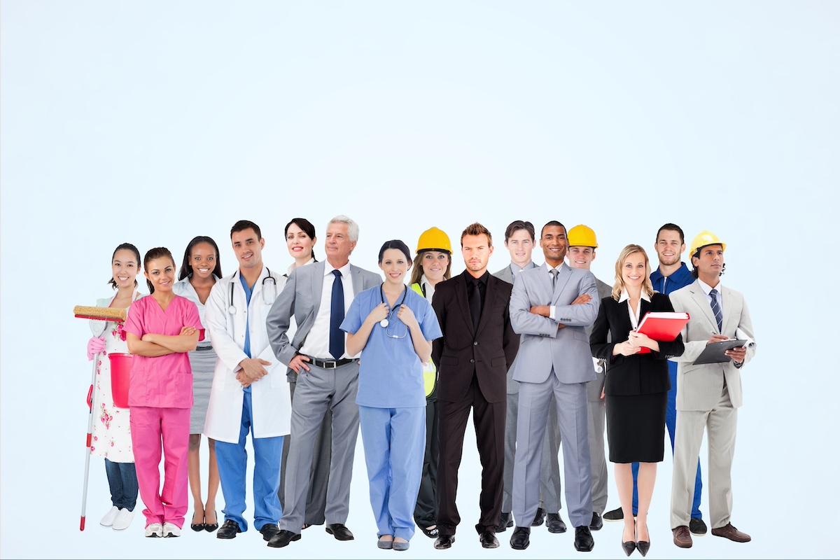 Workers from many different professions are smiling at you, some holding their tools. There are nurses, doctors, office workers, builders, factory workers, cleaners and more.